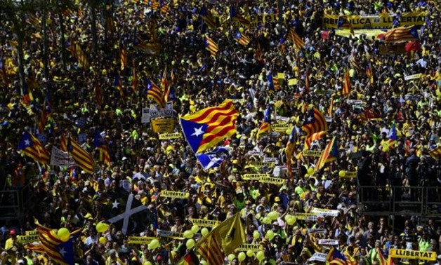 © Lluis Gene, AFP | Thousands of people marched in Barcelona on April 15, 2018 to protest the jailing of nine Catalan separatist leaders facing trial on ‘rebellion’ charges
