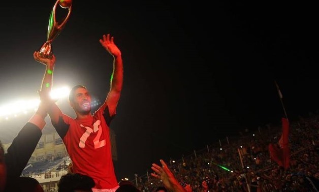 Retired footballer Mohamed Aboutrika celebrates his last African title with Al Ahly, CAF official account on twitter