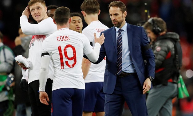 London, Britain - March 27, 2018 England manager Gareth Southgate and Lewis Cook after the match REUTERS/Darren Staples
