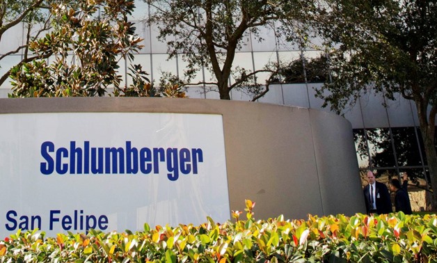 FILE PHOTO: The exterior of the Schlumberger Corporation headquarters building is pictured in the Galleria area of Houston January 16, 2015. REUTERS/Richard Carson/File Photo