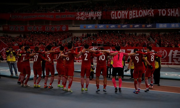 FILE PHOTO: Football Soccer - Chinese Super League - SIPG v Changchun Yatai FC - Shanghai, China - 4/3/17 - SIPG's players celebrate victory after match. REUTERS/Aly Song/File Photo
