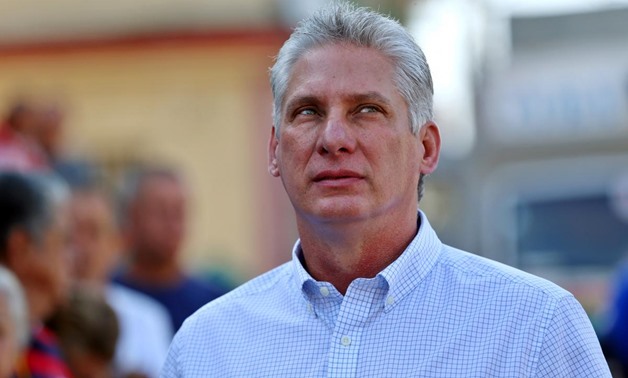 FILE PHOTO: Cuba's First Vice-President Miguel Diaz-Canel stands in line before casting his vote during an election of candidates for the national and provincial assemblies, in Santa Clara, Cuba March 11, 2018. REUTERS/Alejandro Ernesto/Pool/File Photo