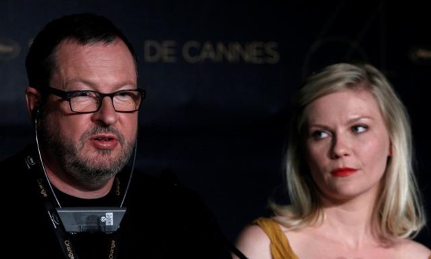 FILE PHOTO: Director Lars Von Trier (L) and cast member Kirsten Dunst attend a news conference for the film "Melancholia", in competition at the 64th Cannes Film Festival, May 18, 2011. REUTERS/Yves Herman/File Photo.