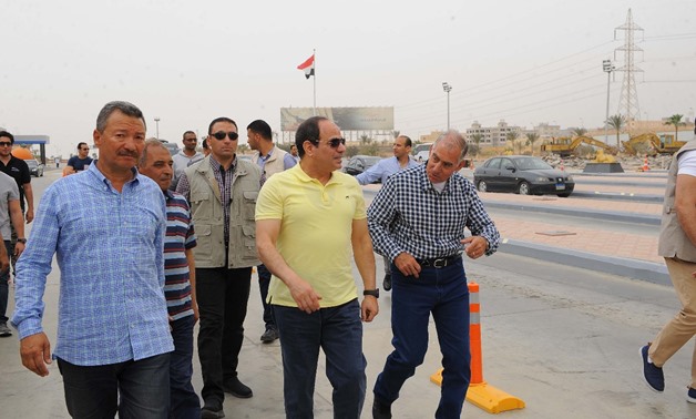 FILE- President Abdel Fatah al-Sisi inspected the ongoing expansion works of the Cairo-Ain Sokhna Road