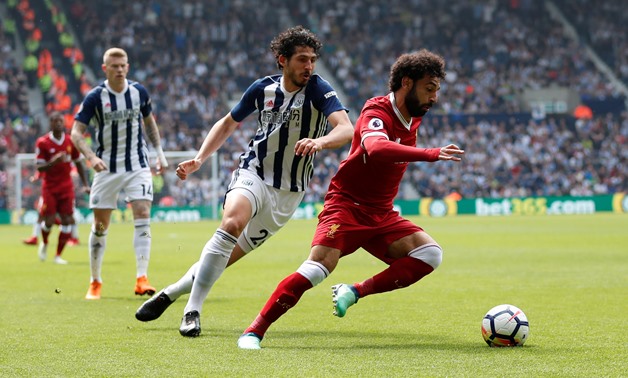 Soccer Football - Premier League - West Bromwich Albion v Liverpool - The Hawthorns, West Bromwich, Britain - April 21, 2018 Liverpool's Mohamed Salah in action with West Bromwich Albion's Ahmed Hegazi Action Images via Reuters/Andrew Boyers 