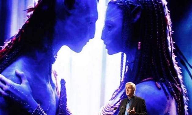 FILE PHOTO - Film director James Cameron delivers a keynote address titled "Renaissance now in imagination and technology" in front of an image of his movie "Avatar" during the Seoul Digital Forum 2010 May 13, 2010. REUTERS/Jo Yong-Hak.