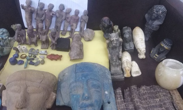 Ancient antiquities seized by the police before smuggling from Minya, Upper Egypt - Press photo on April 24, 2018