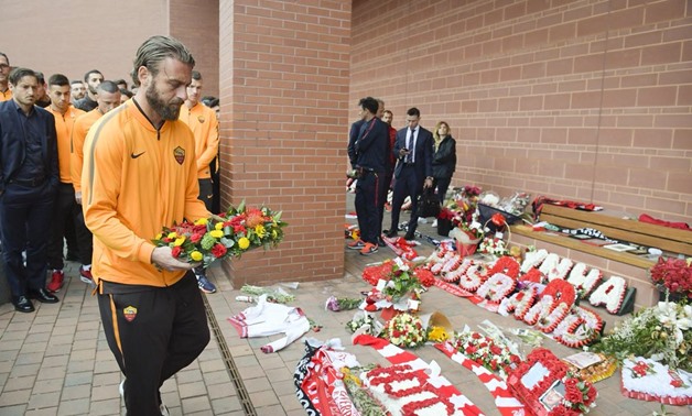 Daniele Di Rossi Roma’s captain putting flowers on Hillsborough memorial – Press image courtesy of AS Roma’s official Twitter