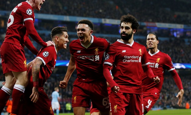 Soccer Football - Champions League Quarter Final Second Leg - Manchester City vs Liverpool - Etihad Stadium, Manchester, Britain - April 10, 2018 Liverpool's Mohamed Salah celebrates scoring their first goal with teammates REUTERS/Andrew Yates 