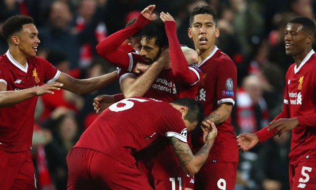 Soccer Football - Champions League Semi Final First Leg - Liverpool vs AS Roma - Anfield, Liverpool, Britain - April 24, 2018 Liverpool's Mohamed Salah celebrates scoring their first goal with team mates Action Images via Reuters/Carl Recine