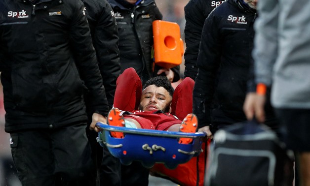 Soccer Football - Champions League Semi Final First Leg - Liverpool vs AS Roma - Anfield, Liverpool, Britain - April 24, 2018 Liverpool's Alex Oxlade-Chamberlain is stretchered off to be substituted after sustaining an injury REUTERS/Phil Noble 