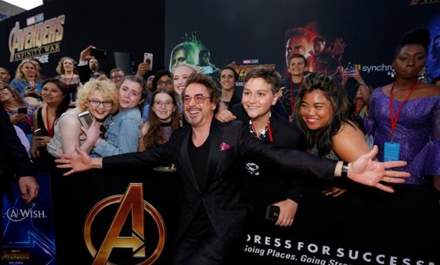 Premiere of “Avengers: Infinity War” - Arrivals - Los Angeles, California, U.S., 23/04/2018 - Actor Robert Downey Jr. poses with fans. REUTERS/Mario Anzuoni.