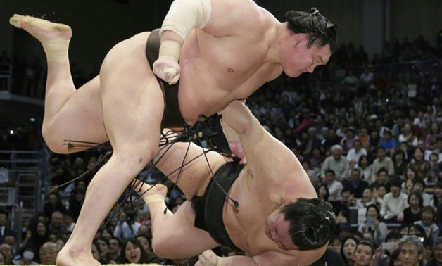 Sumo dates back some 2,000 years and retains many Shinto religious overtones
JIJI PRESS/AFP / -
