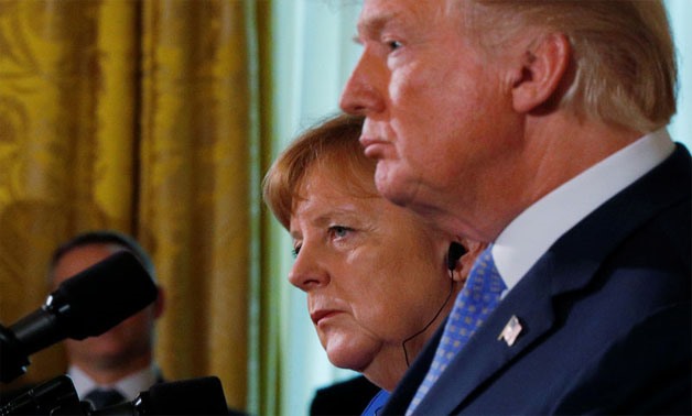U.S. President Donald Trump and Germany's Chancellor Angela Merkel hold a joint news conference in the East Room of the White House in Washington, U.S., April 27, 2018 - REUTERS/Brian Snyder