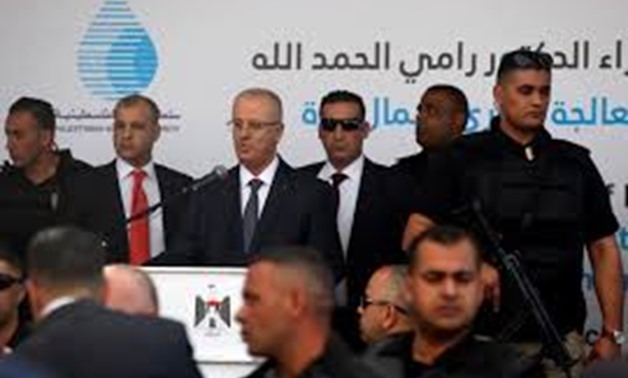 Palestinian Prime Minister Rami Hamdallah speaks during the inauguration ceremony of a waste treatment plant after an explosion targeted his convoy, in the northern Gaza Strip March 13, 2018. REUTERS/Mohammed Salem