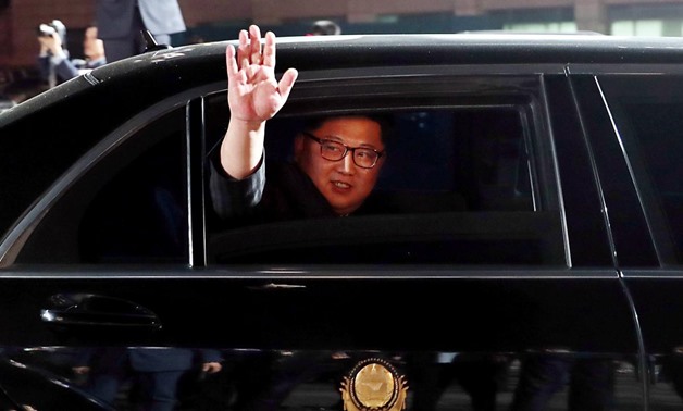 North Korean leader Kim Jong Un (inside a vehicle) bids farewell to South Korean President Moon Jae-in as he leaves after a farewell ceremony at the truce village of Panmunjom inside the demilitarized zone separating the two Koreas, South Korea, April 27,