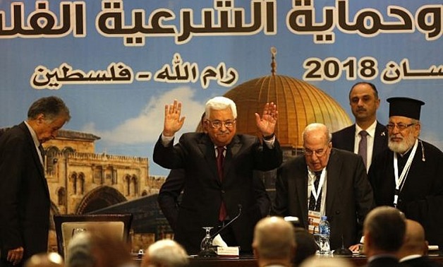 Palestinian Authority President Mahmoud Abbas gestures during the Palestinian National Council meeting in Ramallah on April 30, 2018. (AFP Photo/Abbas Momani)
