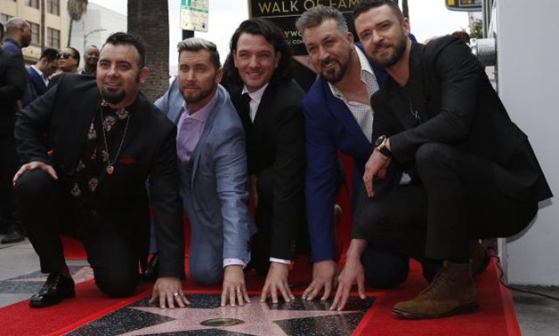 American boy band *NSYNC pose during the unveiling ceremony of their star on the Hollywood Walk of Fame in Los Angeles, U.S. April 30, 2018. REUTERS/Mario Anzuoni.