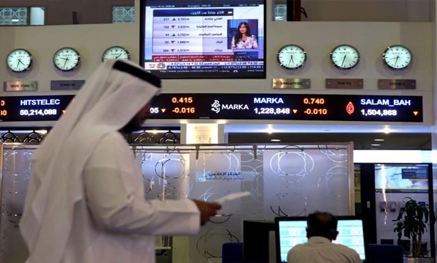 Traders monitor stock information at Dubai Financial Market, in Dubai, United Arab Emirates, June 5, 2017. REUTERS/Stringer