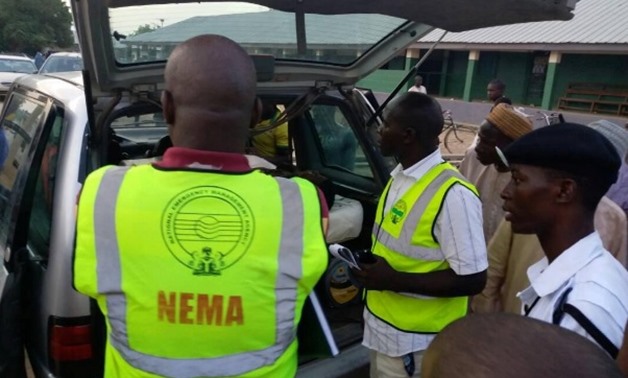 Members of the National Emergency Management Agency (NEMA) evacuate casualties from the site of blasts attack in Mubi, in northeast Nigeria May 1, 2018. NEMA/Handout via REUTERS