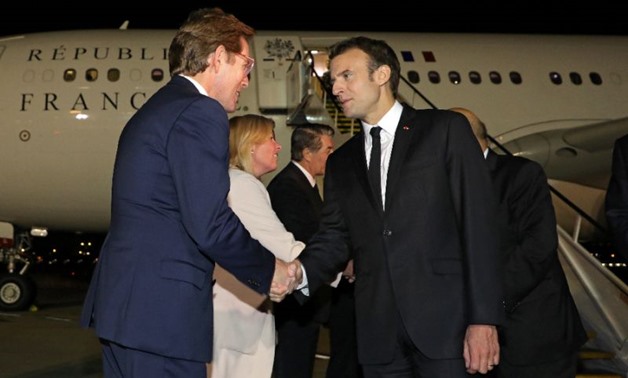 Emmanuel Macron (R) is expected to say France is willing to do much more with Australia in the South Pacific (AFP Photo/ludovic MARIN)
