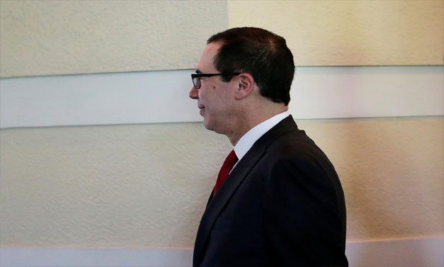U.S. Commerce Secretary Wilbur Ross (C), a member of the U.S. trade delegation to China, leaves a hotel in Beijing, China May 3, 2018. REUTERS/Jason Lee