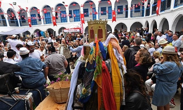 Jews gather at the Ghriba synagogue in Tunisia's Mediterranean resort island of Djerba on the first day of the annual Jewish pilgrimage to the synagogue on May 2, 2018. (AFP PHOTO / FETHI BELAID)