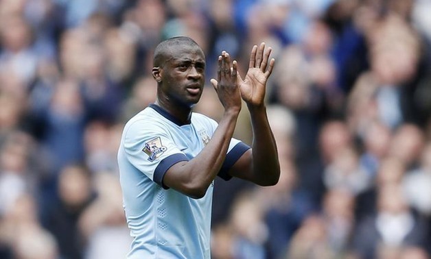 Manchester City's Yaya Toure applauds fans as he is substituted – Reuters/Carl Recine
