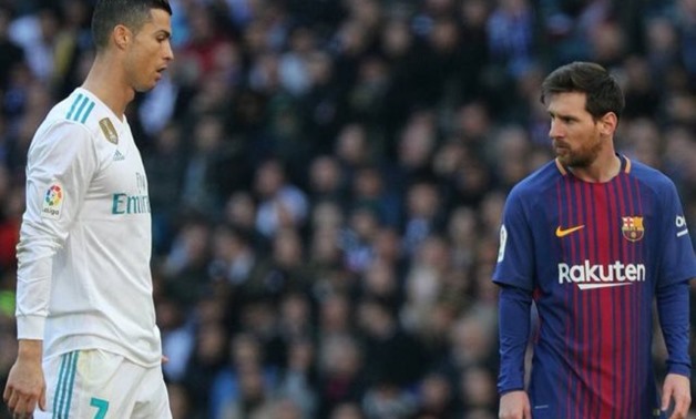 FILE – Cristiano Ronaldo and Lionel Messi