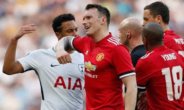 FILE PHOTO: Soccer Football - FA Cup Semi-Final - Manchester United v Tottenham Hotspur - Wembley Stadium, London, Britain - April 21, 2018 Referee Anthony Taylor speaks with Tottenham's Mousa Dembele and Manchester United's Phil Jones Action Images via R