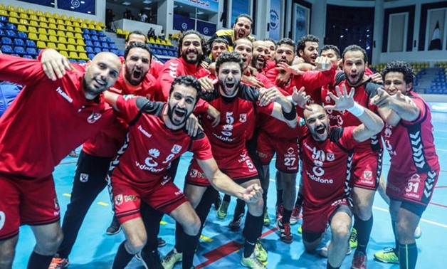 File- Al-Ahly players celebrate their victory 