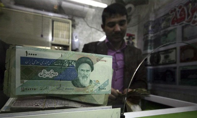 Iranian rial banknotes are seen at a currency exchange shop in Kerbala, 110 km (70 miles) south of Baghdad January 27, 2012. REUTERS/Mushtaq Muhammed