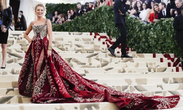 Actor Blake Lively arrives at the Metropolitan Museum of Art Costume Institute Gala (Met Gala) to celebrate the opening of “Heavenly Bodies: Fashion and the Catholic Imagination” in the Manhattan borough of New York, U.S., May 7, 2018. REUTERS/Carlo Alleg