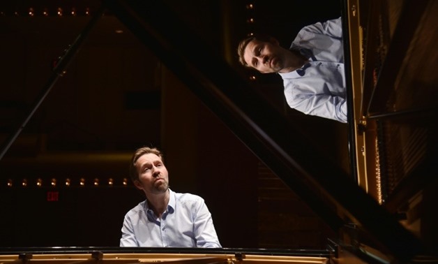 Norwegian virtuoso Leif Ove Andsnes, seen here at the piano in Lincoln Center's David Geffen Hall May 2, 2018, tackles Chopin's famous Ballades in his latest CD-AFP / HECTOR RETAMAL
