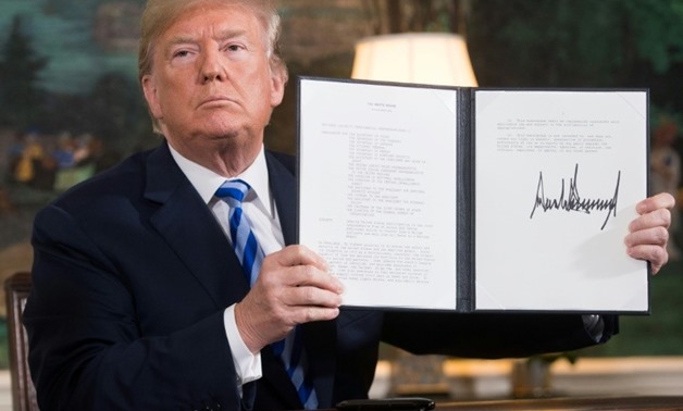 US President Donald Trump signed a document reinstating sanctions against Iran on May 8
