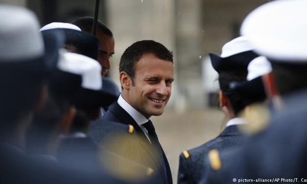 Emmanuel Macron winks - AFP

