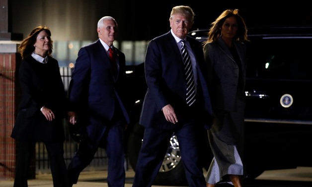U.S. President Donald Trump and first lady Melania Trump, U.S. Vice President Mike Pence and his wife Karen arrive to greet Americans formerly held hostage in North Korea, at Joint Base Andrews, Maryland, U.S., May 10, 2018. REUTERS/Jonathan Ernst