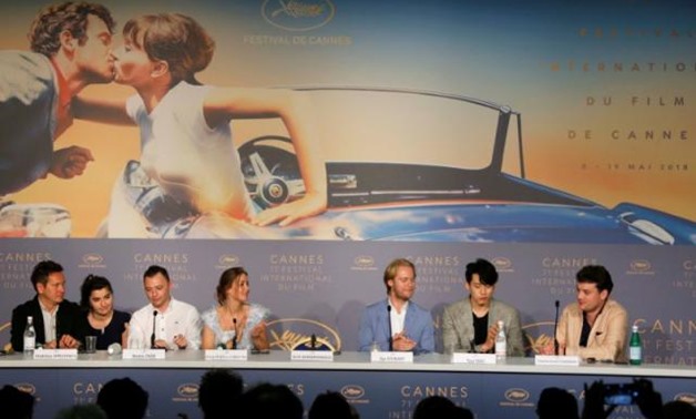 71st Cannes Film Festival – News conference for the film "Summer" (Leto) in competition – Cannes, France May 10, 2018. Director of photography Vladislav Opeliants, cast members Roma Zver, Irina Starshenbaum, director Kirill Serebrennikov's empty seat, Teo