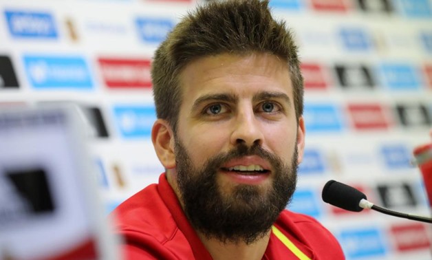 FILE PHOTO - Spain's national soccer team player Gerard Pique smiles during a news conference at the training grounds in Las Rozas, outside Madrid, Spain October 4, 2017. REUTERS/Sergio Perez
