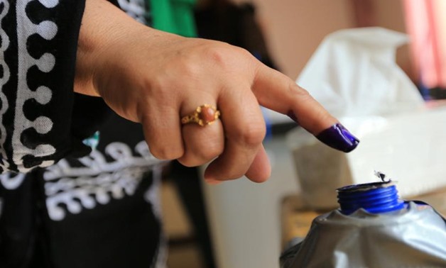 An Iraqi woman's finger is seen stained with ink at a polling station during the parliamentary election in Sulaimaniyah, Iraq May 12, 2018. REUTERS/Ari Jalal
