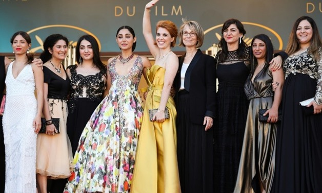 Director Eva Husson (centre), Swedish actress Evin Ahmad (left),Iranian actress Golshifteh Farahani (4th right), producer Didar Domehri (3rd right) pose with French Culture Minister Francoise Nyssen (4th right) at screening of "Girls of the Sun (Les Fille