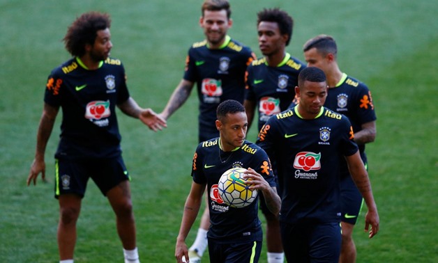 Football Soccer - Brazil's national team training - World Cup 2018 Qualifiers - Mineirao Stadium, Belo Horizonte, Brazil - 8/11/16 - Brazil's player Neymar and his teammates leave the field after a training session. REUTERS/Ricardo Moraes
