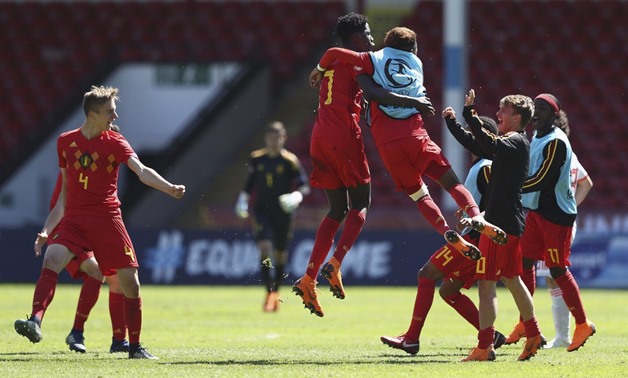 Belgian players celebrate after the game, photo courtesy of UEFA.com