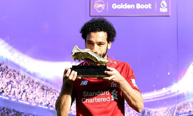 PRESS: Mohamed Salah poses with his Premier League Golden Boot Award