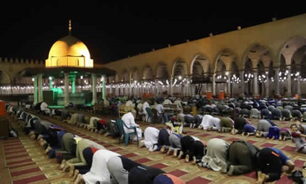 Worshipers perform Taraweeh prayer in Amr Ibn al-As Mosque - File photos