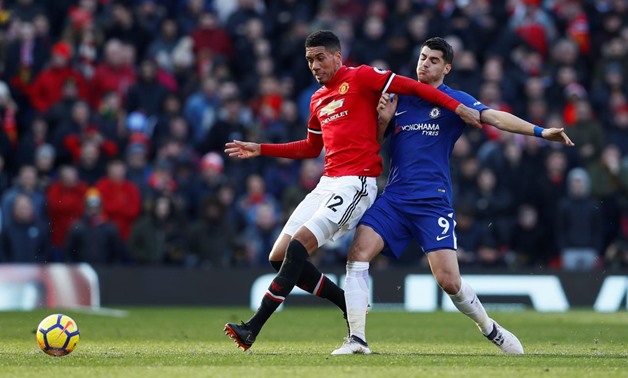 Soccer Football - Premier League - Manchester United vs Chelsea - Old Trafford, Manchester, Britain - February 25, 2018 Manchester United's Chris Smalling in action with Chelsea’s Alvaro Morata Action Images via Reuters/Jason Cairnduff