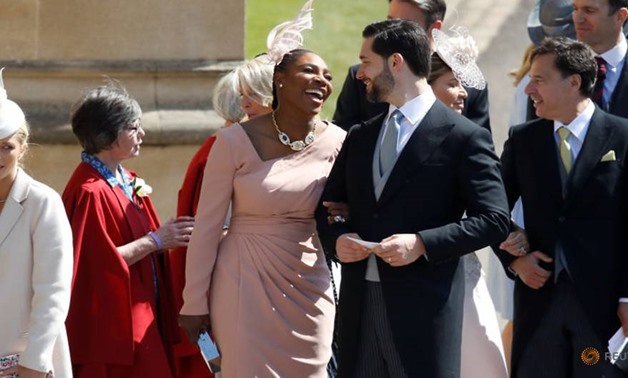 Meghan Markle's friend, US tennis player Serena Williams (CL) and her husband US entrepreneur Alexis Ohanian (CR) arrive for the wedding ceremony of Britain's Prince Harry, Duke of Sussex and US actress Meghan Markle at St George's Chapel, Windsor Castle,
