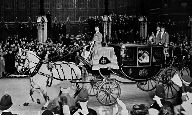 Britain's future Queen Elizabeth II and Prince Philip cheered by crowds after their wedding in 1947.