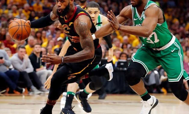 May 19, 2018; Cleveland, OH, USA; Cleveland Cavaliers forward LeBron James (23) drives to the basket in front of Boston Celtics forward Semi Ojeleye (37) during the first half in game three of the Eastern conference finals of the 2018 NBA Playoffs at Quic