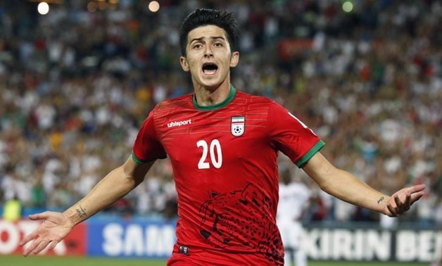 Iran's Sardar Azmoun celebrates his goal during their Asian Cup Group C soccer match against Qatar at the Stadium Australia in Sydney January 15, 2015. REUTERS/Jason Reed
